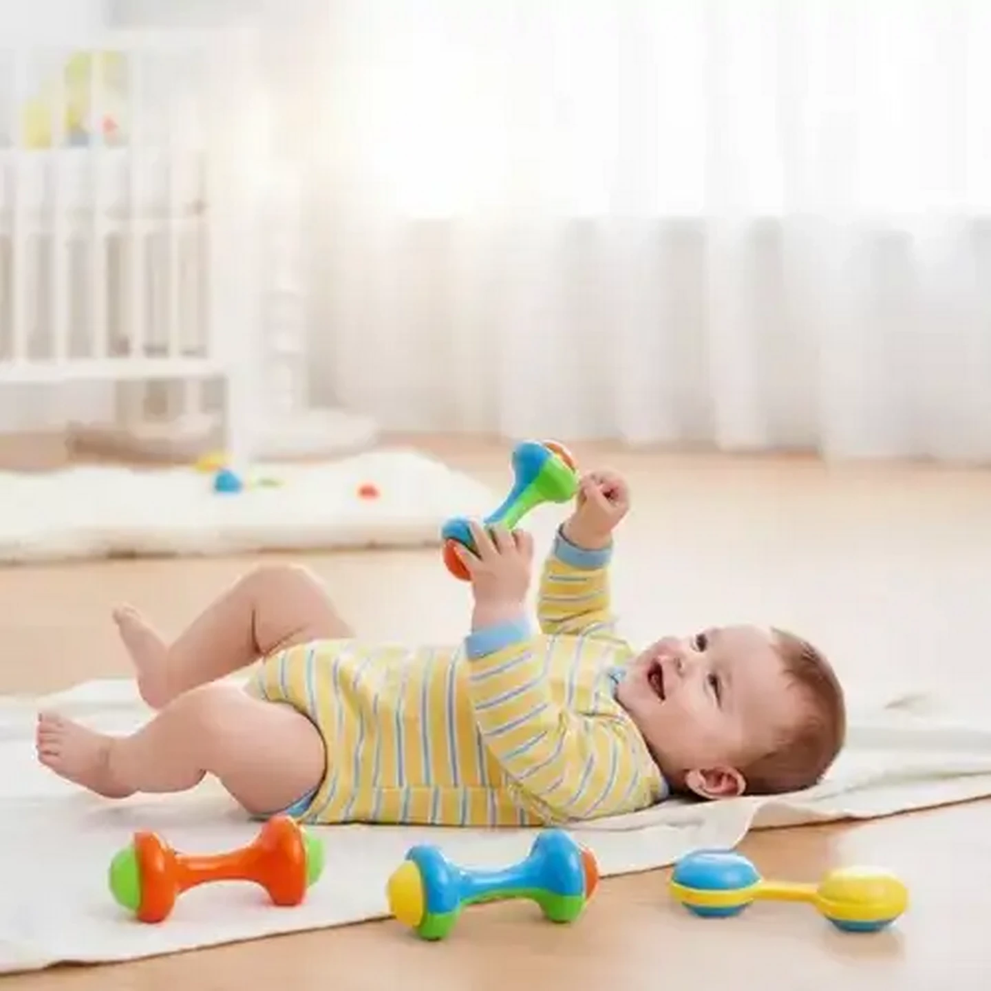 Image of Jolly Tots Dumbell & Shaker Rattle 3 Months+ (Colour May Vary)