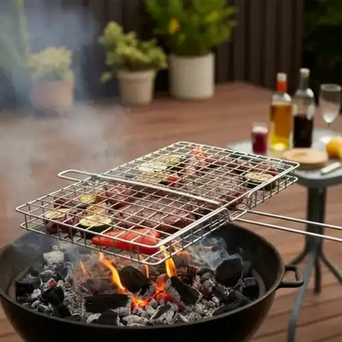 Image of Bush Baby Stainless Steel Braai Grid with Adjustable Handle 44 x 34cm