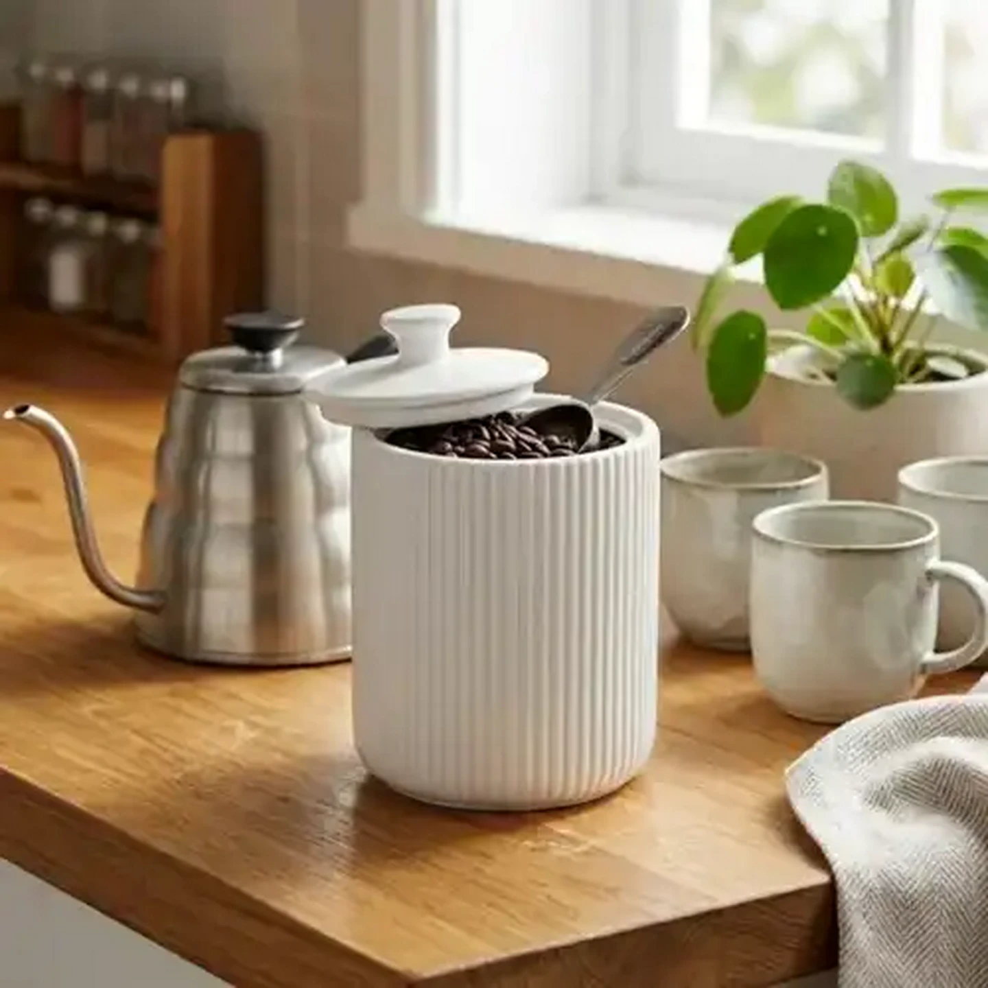 Image of White Embossed Ceramic Canister 1s (Design May Vary)