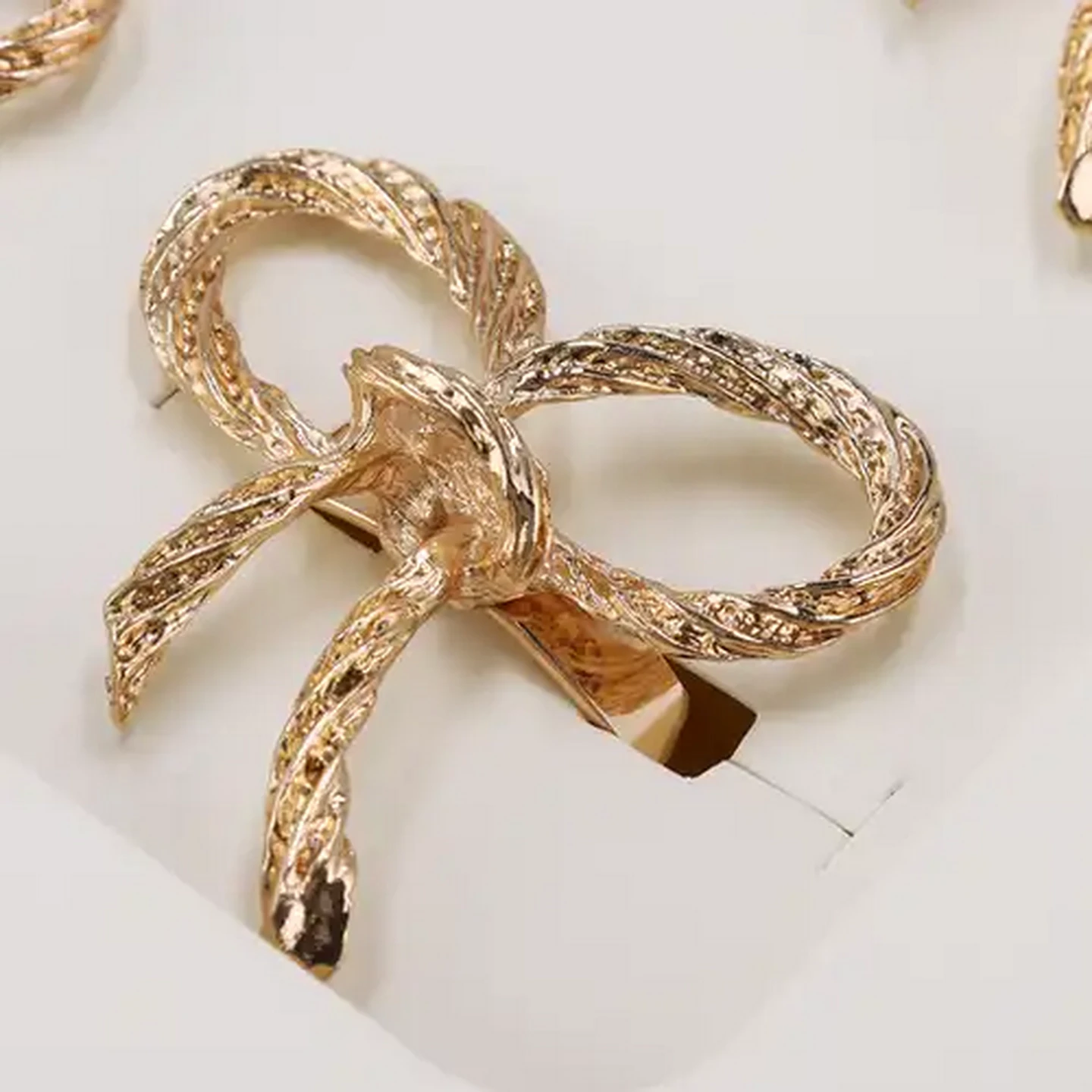 Image of Gold Bow Napkin Ring Set 4-Pack