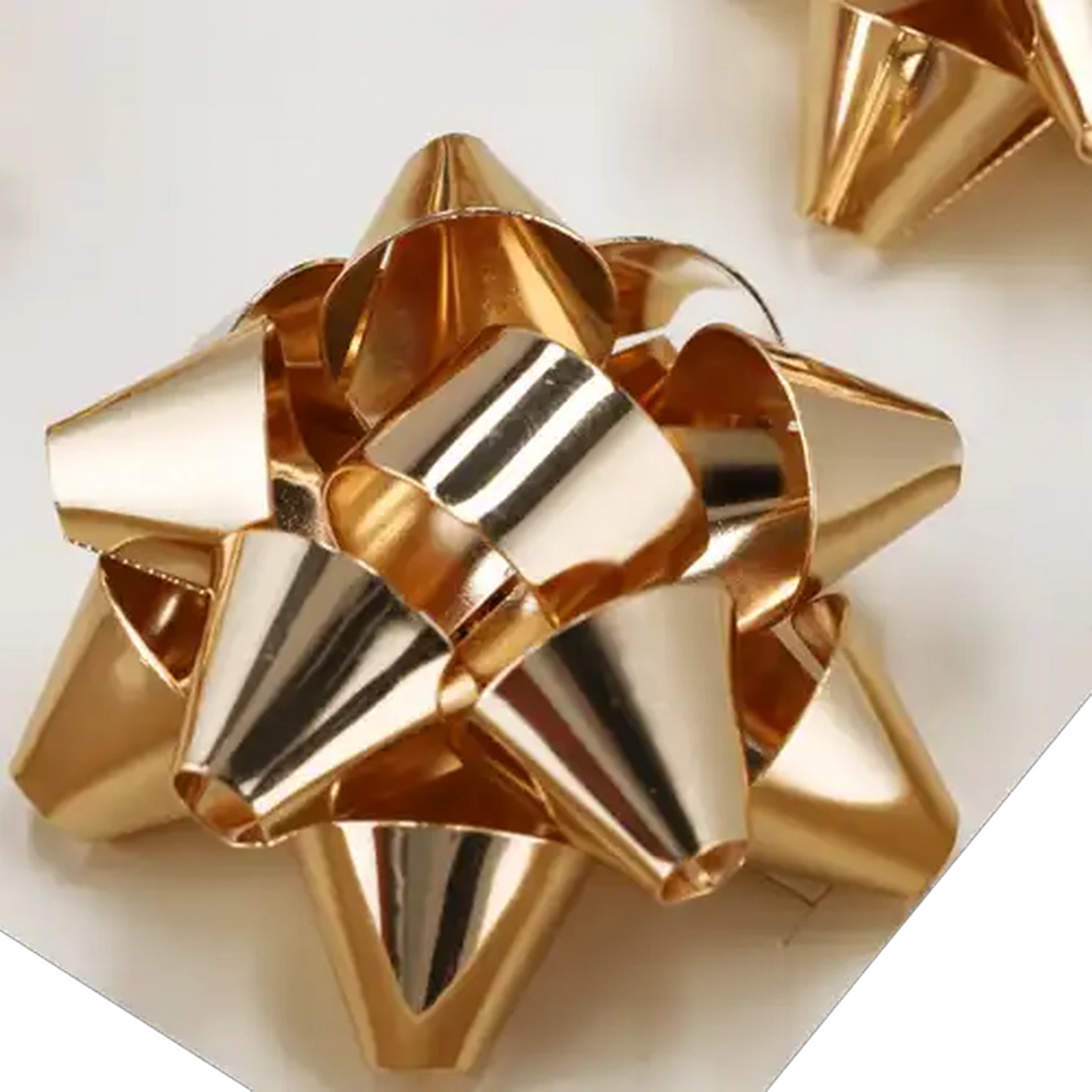 Image of Gold Bow Napkin Ring Set 4-Pack